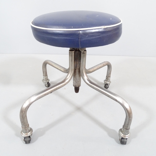 2018 - A mid-century modernist tubular steel industrial height adjustable stool with blue leather seat. Low... 