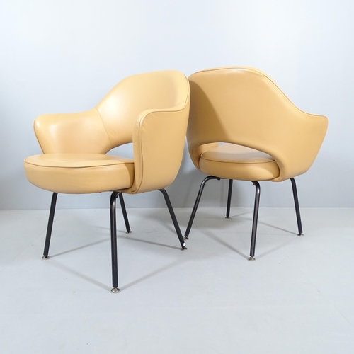 2031 - EERO SAARINEN - a pair of Knoll Executive armchairs in tan leather with impressed Knoll Studio and S... 