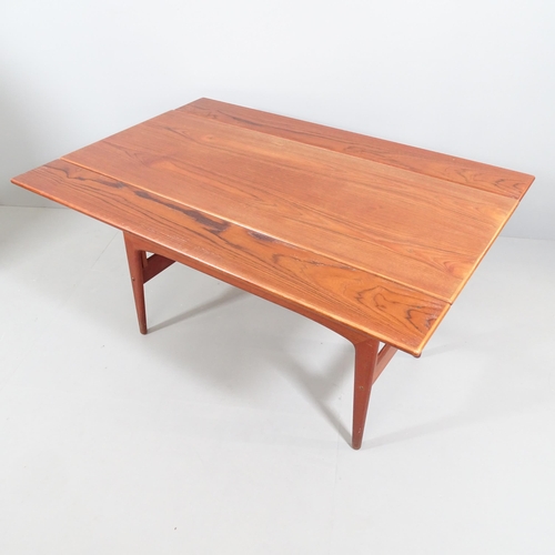 2037 - A mid-century Danish teak Copenhagen metamorphic coffee/dining table, with rise and fall mechanism a... 