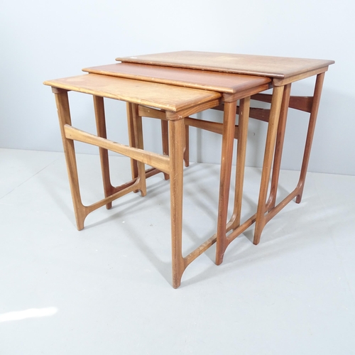 2047 - A mid-century Danish teak nest of three occasional tables with label for BC Mobler. Largest 60x52x39... 