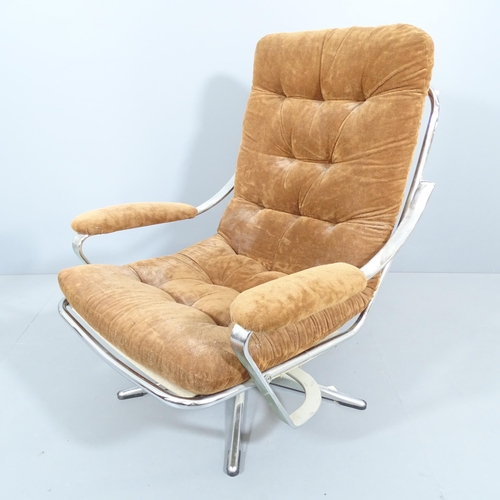 2000 - A mid-century design chrome and upholstered swivel lounge chair in the manner of Geoffrey Harcourt. ... 