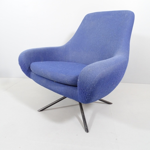 2001 - SUSANNE GRONLUND - a SoftLine Noomi blue swivel lounge chair. With sewn maker's label.