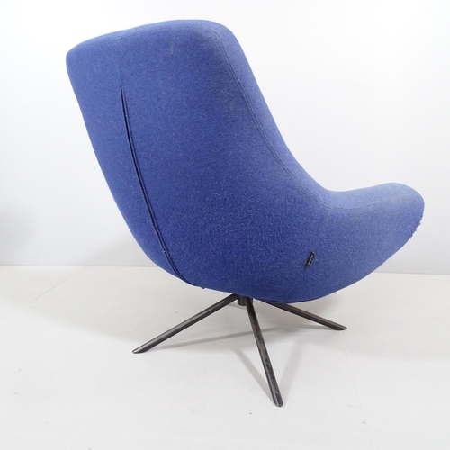 2001 - SUSANNE GRONLUND - a SoftLine Noomi blue swivel lounge chair. With sewn maker's label.