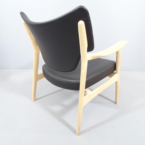 2009 - A mid-century Scandinavian design Veng lounge chair in black leather and soaped oak by Torbjorn Bekk... 