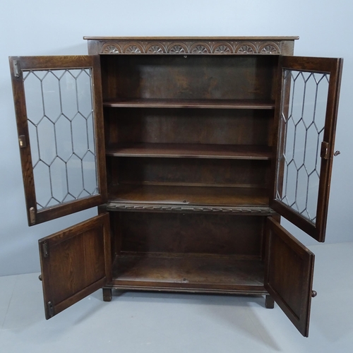 2144 - A Jaycee oak linenfold and leadlight glazed 2-door bookcase. 95x136x33cm. With key.