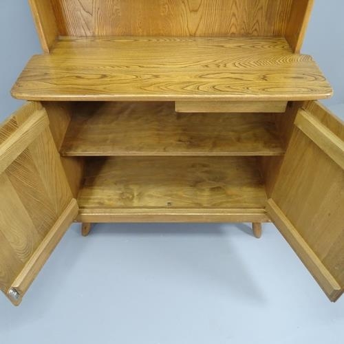 2145 - A mid-century Ercol style oak dresser with inset maker's label to back. 99x168x42cm (with key)