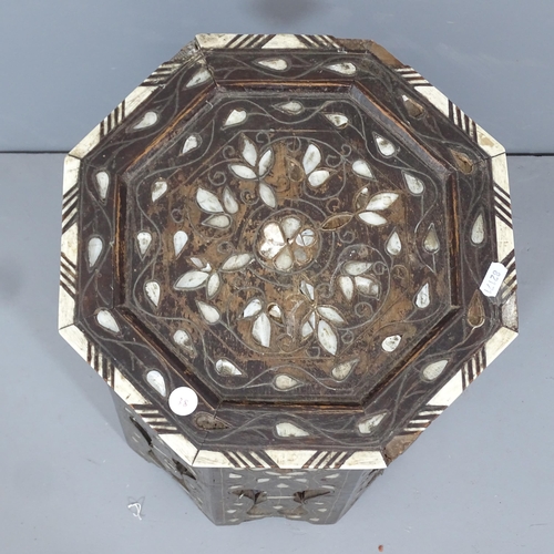 2150 - An Anglo-Indian octagonal occasional table with inlaid metal, bone and mother-of-pearl decoration. 3... 