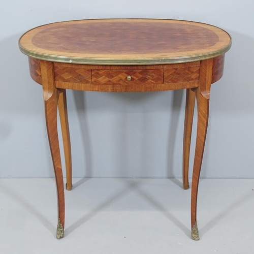 2153 - A French oval mahogany and ormolu mounted parquetry occasional table with single frieze drawer. 72x7... 