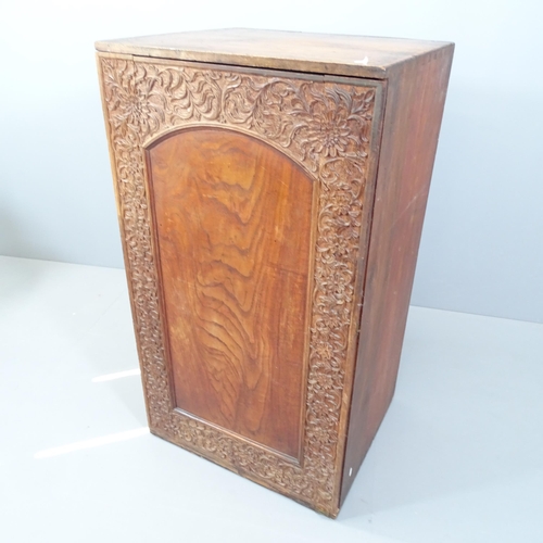 2155 - An antique gothic oak cupboard with single carved and panelled door and shelf fitted interior. 67x11... 