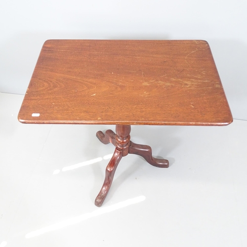 2160 - An antique mahogany rectangular tilt-top occasional table on tripod base. 74x73x46cm. When folded he... 