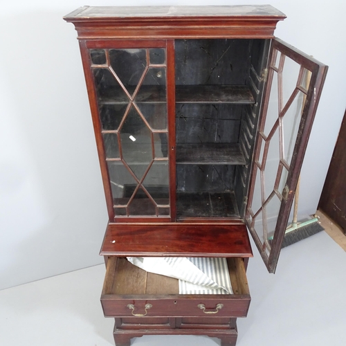 2164 - A 19th century mahogany two-section bookcase on cabinet. 66x165x43cm.