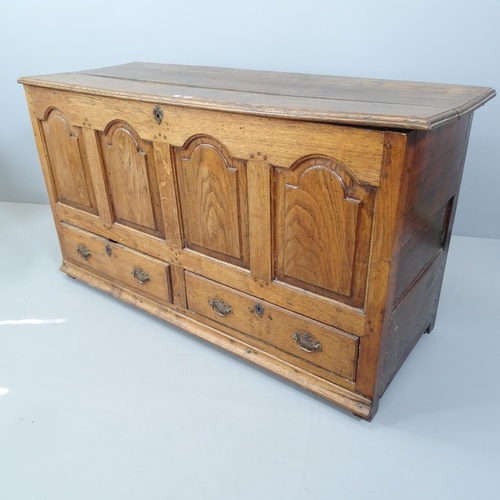 2166 - An 18th Century panelled oak mule chest. 144x78x53cm. A/F.