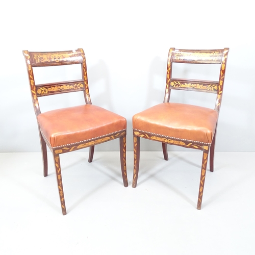 2171 - A pair of 19th century Dutch Regency marquetry inlaid mahogany side chairs, with studded leather uph... 