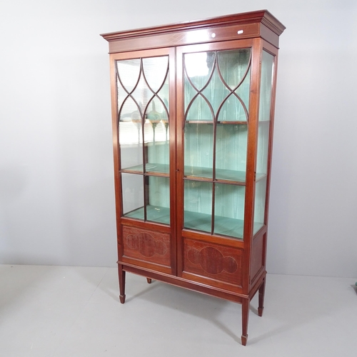 2172 - A 19th century mahogany display cabinet with two lattice glazed doors, two fixed shelves, cupboards ... 