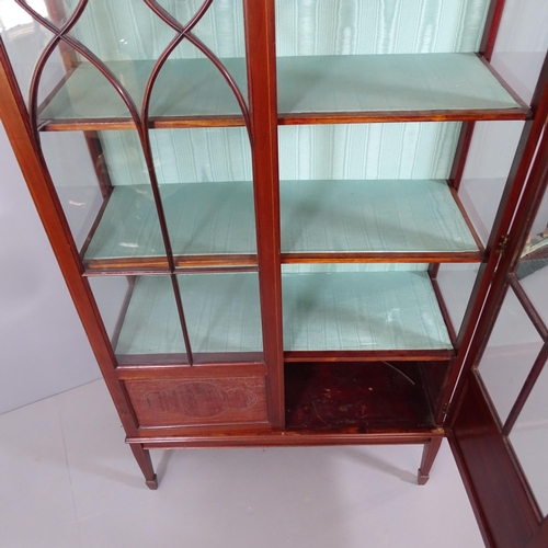 2172 - A 19th century mahogany display cabinet with two lattice glazed doors, two fixed shelves, cupboards ... 