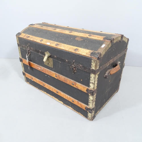 2193 - A Victorian slatted dome-top steamer travelling trunk. 77x56x46cm.