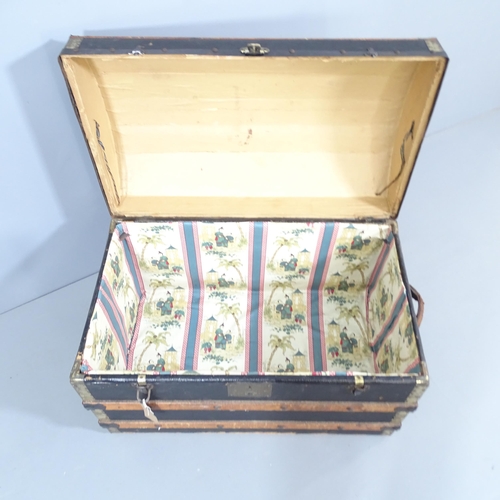 2193 - A Victorian slatted dome-top steamer travelling trunk. 77x56x46cm.