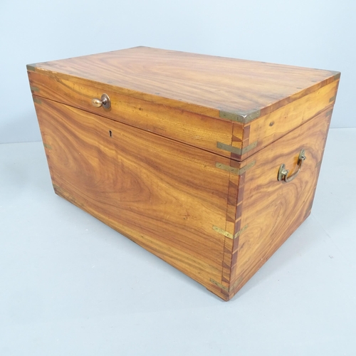 2195 - A Chinese camphorwood and brass bound military-style trunk. 73x45x45cm.