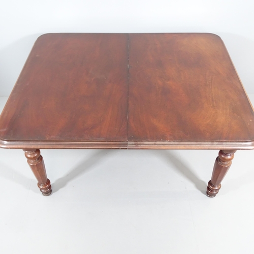 2198 - An antique mahogany drawer leaf dining table, with two spare leaves and raised on turned legs. 155 (... 