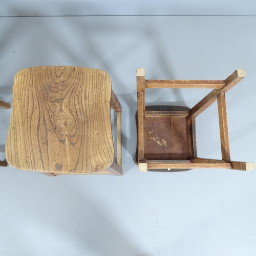 2211 - A matched set of four vintage elm-seated school lab stools. 36x52x34cm.