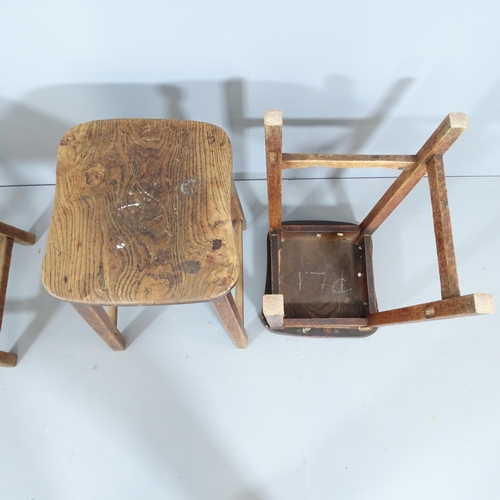 2213 - A matched set of three vintage elm-seated school lab stools. 38x60x40cm.