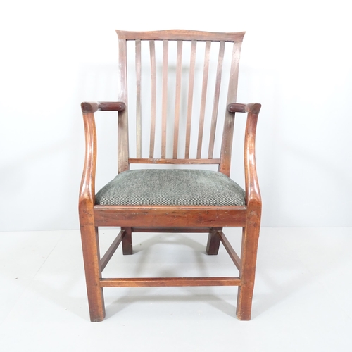 2216 - A Georgian oak armchair with upholstered seat.