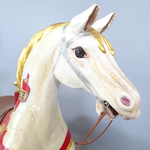 2221 - A genuine Vintage fairground carousel horse with metal pole and platform stand. 150x118x36cm