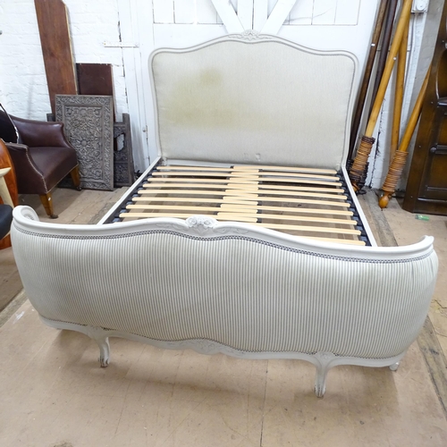 2222 - A French painted and upholstered King size bed, with side rails and adjustable slatted base.