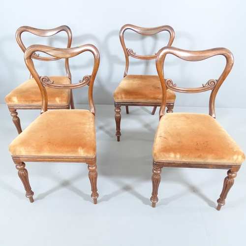 2224 - A set of four Victorian rosewood and upholstered balloon back dining chairs.