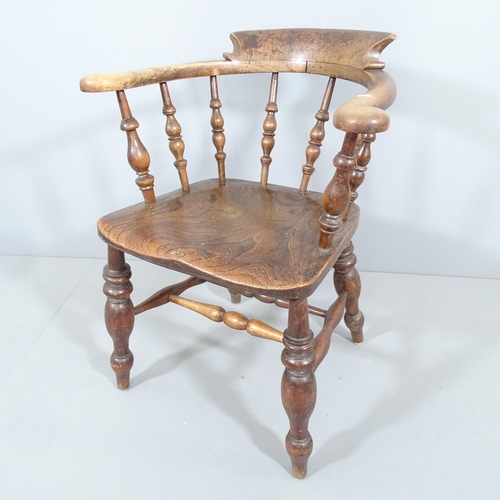 2227 - An antique elm-seated smoker's bow-arm chair.