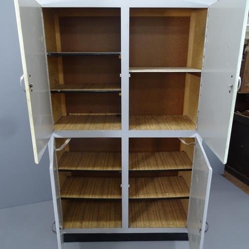 2230 - A mid century grey painted 4-door larder cupboard, with shelf fitted interior. 110x180x45cm