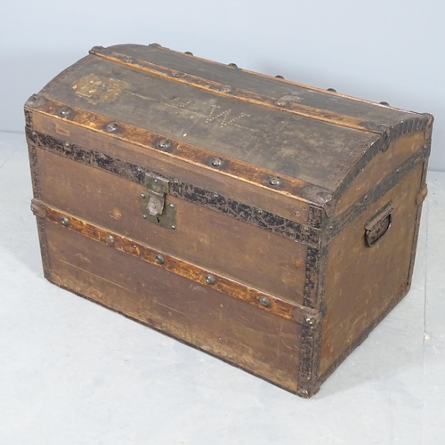 2506 - A Victorian metal-bound dome top trunk. 74x52x47cm.