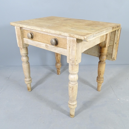 2508 - An antique pine table, with single drop leaf, frieze drawer and raised on turned legs. 82x72x58cm.