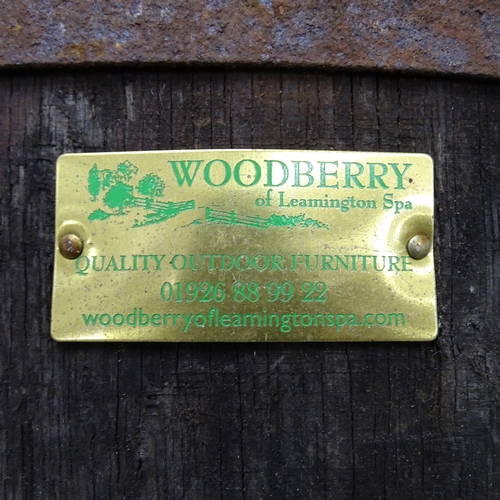 2512 - A vintage coopered-oak barrel. With label for Woodberry of Leamington Spa. 74x88cm.