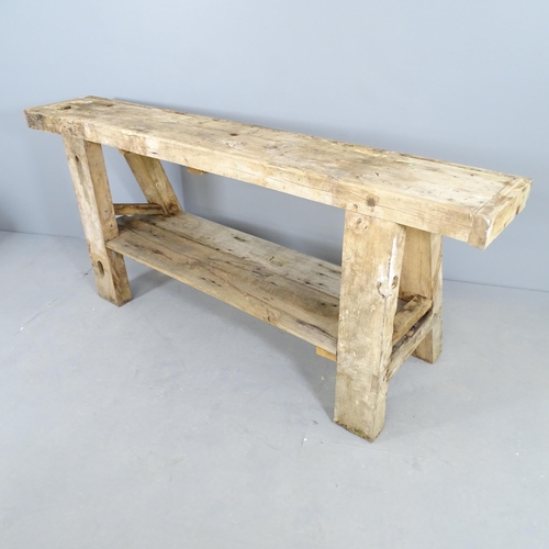 2517 - A vintage pine workbench. 181x79x52cm.