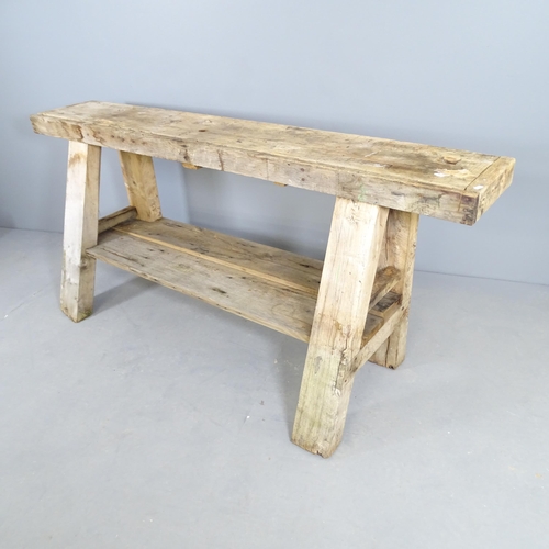 2517 - A vintage pine workbench. 181x79x52cm.