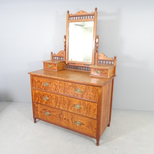 2520 - A Victorian oak and pine dressing chest , with raised mirrored back and five drawers. 108x163x52cm.