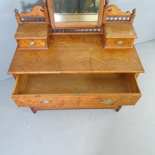 2520 - A Victorian oak and pine dressing chest , with raised mirrored back and five drawers. 108x163x52cm.