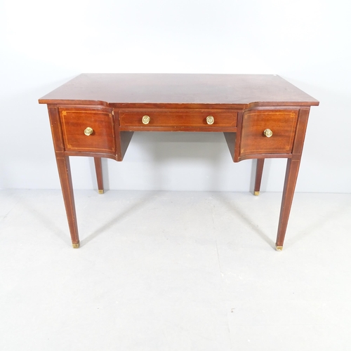 2527 - A 19th century style mahogany bow front writing desk, with three frieze drawers and raised on square... 