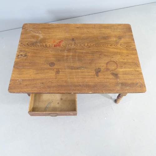 2532 - A Japanese elm low table, with two frieze drawers and raised on turned legs. 85x32x59cm.