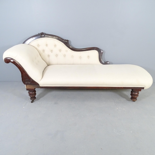 2542 - A Victorian mahogany and upholstered chaise longue. 188x86x70cm.