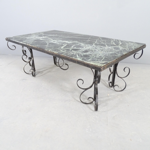 2549 - A rectangular green marble topped table on wrought iron base. 107x39x59cm.