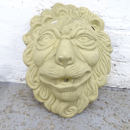 2577 - A concrete lion wall mask, height 54cm.