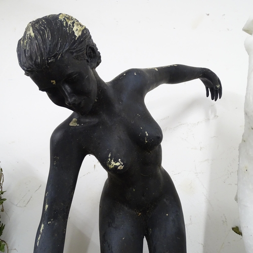 2584 - A composite garden statue of a lady, height 66cm