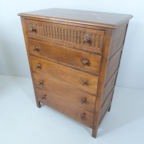 2231 - A reproduction Ipswich Oak design chest of five long drawers, with label for Webber Furniture. 88x11... 