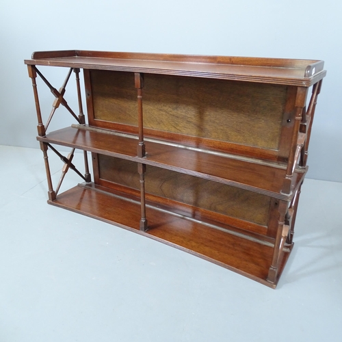 2236 - A 19th century mahogany concave fronted hanging shelf. 92x57x23cm.