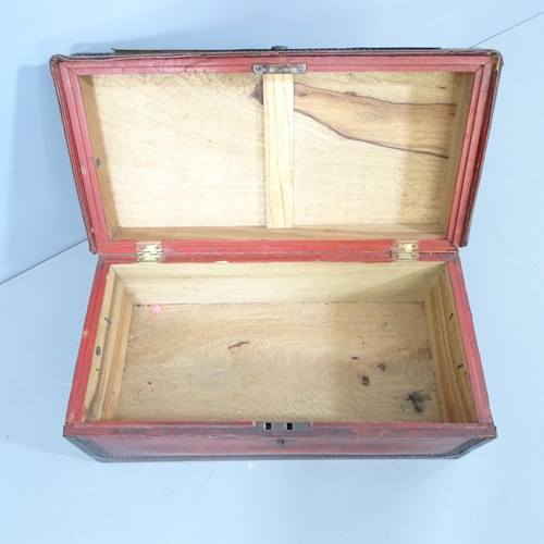 2238 - An antique camphorwood chest, covered with brass-studded leather. 61x26x31cm.