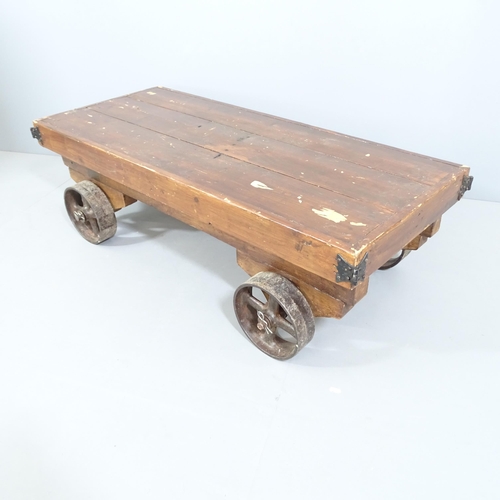 2244 - A vintage industrial trolley. 128x40x55cm.