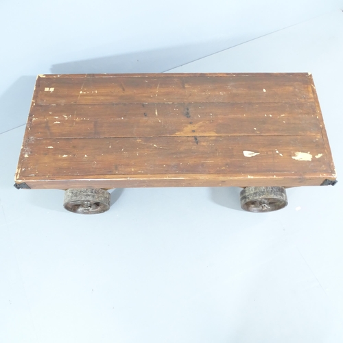 2244 - A vintage industrial trolley. 128x40x55cm.