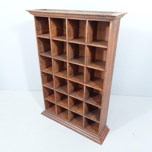 2248 - A stained pine bank of 24 pigeon holes, believed to be from a post office. 69x98x20cm.